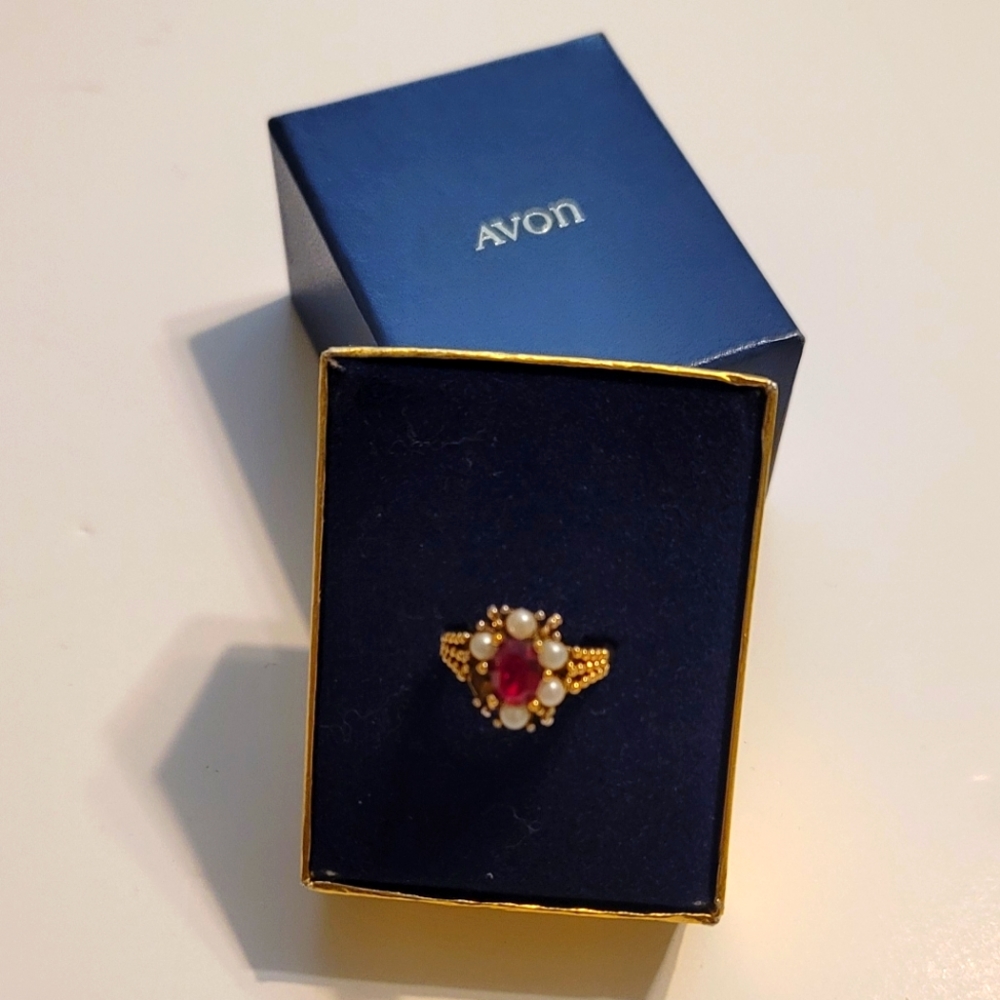 Vintage signed Avon red stone and faux pearl filigree gold toned Ring.